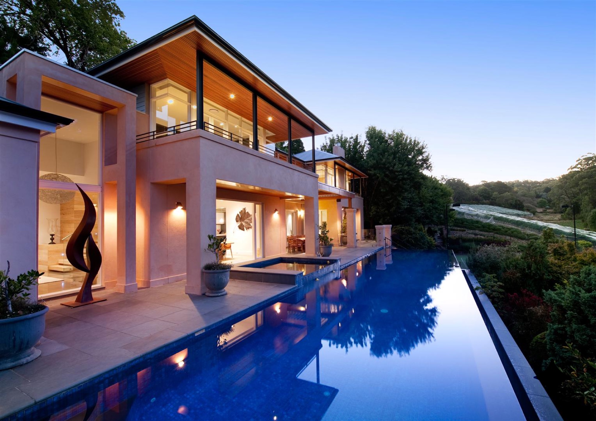 Completed BOWCON residence with pool at dusk